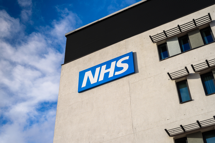 A building with a large NHS sign on the outside
