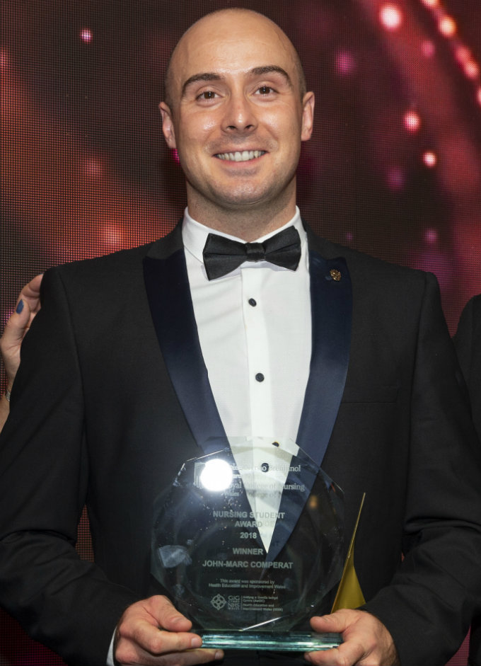 John-Marc winning his award