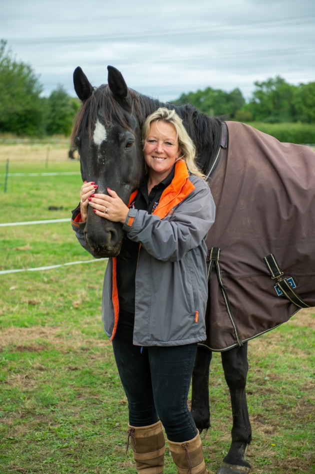 Dina Shale, founder of The Way of the Horse, with one of the therapy horses
