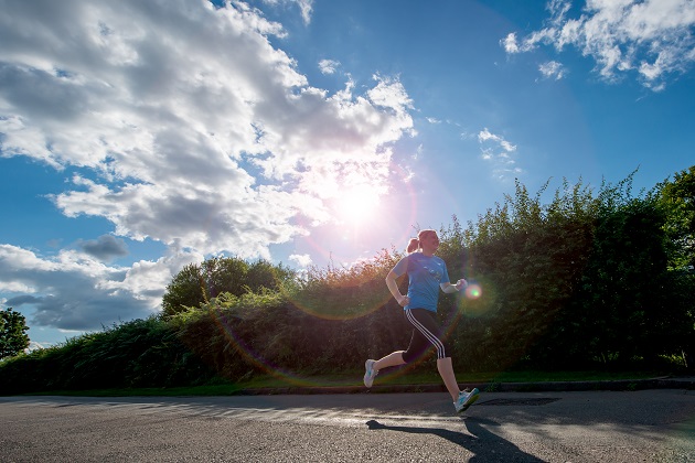 Claire Flatt running in sunshine