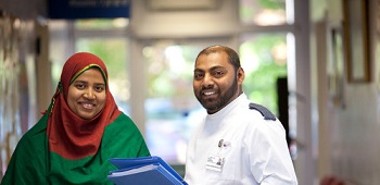 Nurse smiling with patient