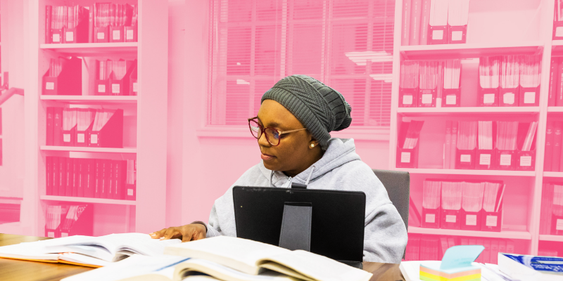A member studying in the library