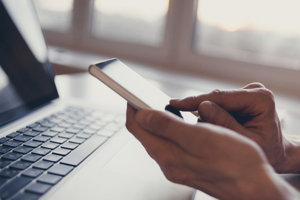 Image of laptop and phone