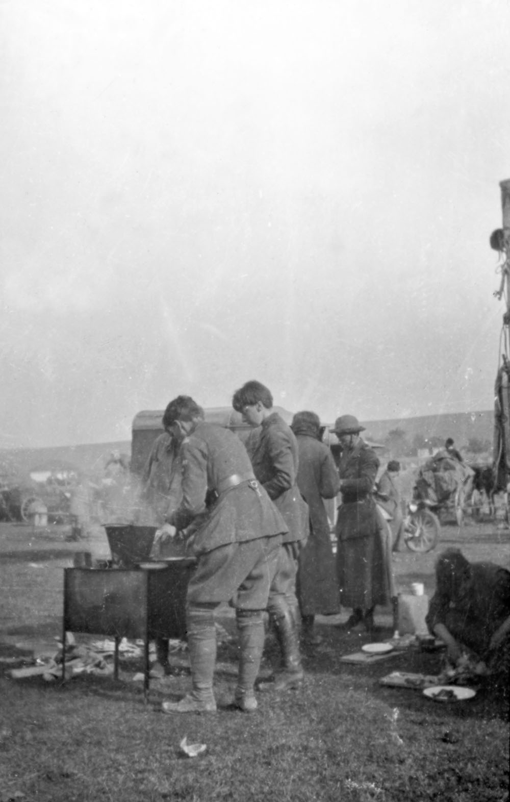 Scottish Women’s Hospitals orderlies cooking in field, Romania.