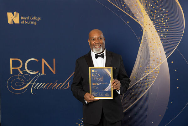 Photo of Michael Lewis holding RCN Award